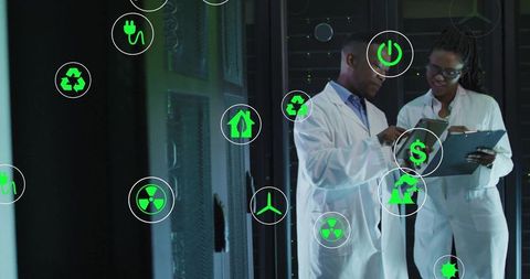 Researchers analyzing sustainability data in technology lab