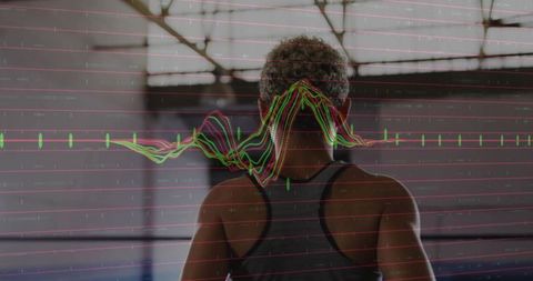 Female Athlete Training with Heart-Rate Waveform Overlay in Boxing Gym Highlighting Form