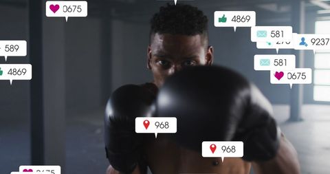 African American Boxer Training Amid Social Media Notifications