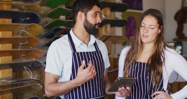 Small Business Owners Discussing Orders in Shop - Download Free Stock Images Pikwizard.com