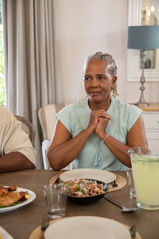 African American Couple Having Meal at Cozy Dining Table