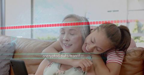 Mother and daughter hugging on couch with smartphone and encrypted data overlay for home privacy