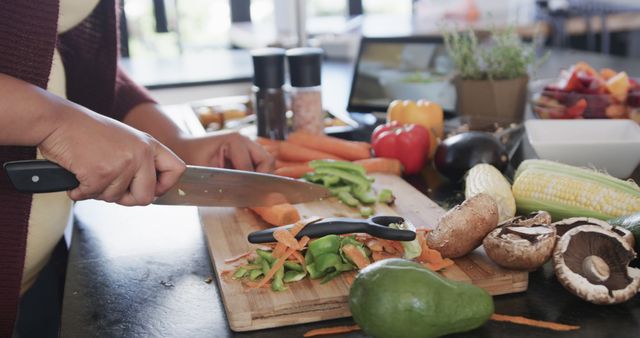 Person Chopping Vegetables in Modern Kitchen - Download Free Stock Images Pikwizard.com