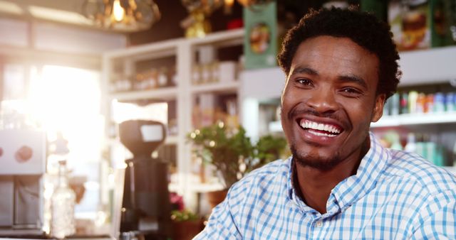 Smiling Young Man in Cozy Coffee Shop - Download Free Stock Images Pikwizard.com