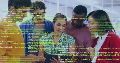 Diverse team collaborating on tablet while reviewing code overlay in modern office