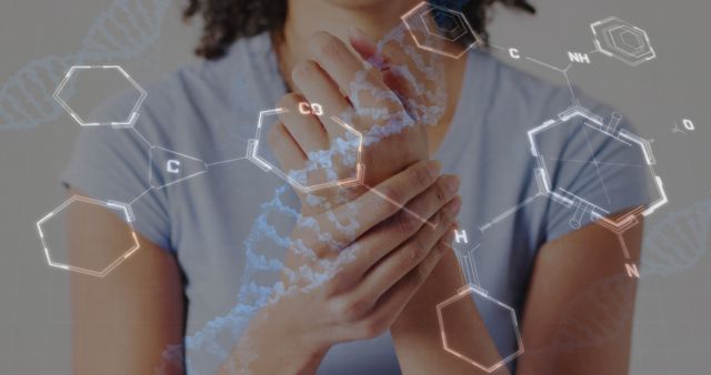 Woman Experiencing Wrist Pain with Molecular Structure Overlay - Download Free Stock Images Pikwizard.com