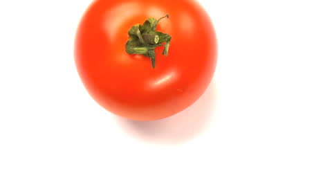 Fresh Red Tomato on a White Background