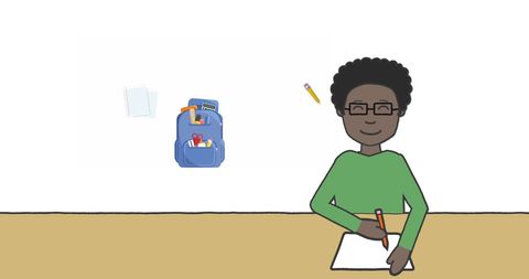 Schoolboy studying at desk with school supply icons