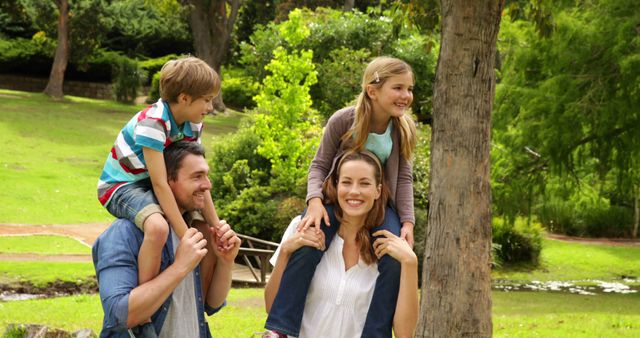 Happy Family Enjoying a Day at the Park - Download Free Stock Images Pikwizard.com