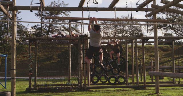 People Challenging Themselves on Outdoor Obstacle Course - Download Free Stock Images Pikwizard.com