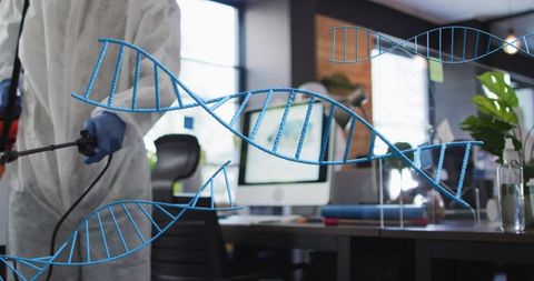 Disinfecting modern office with ppe sprayer and dna helix overlay representing biosecurity