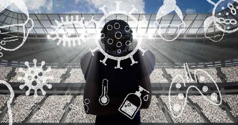 Rugby player with covid-19 icons in sports stadium