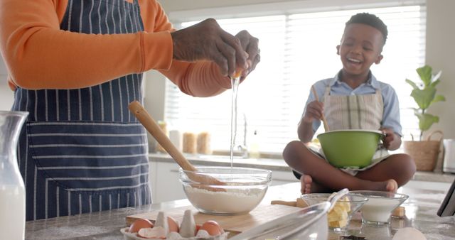 Father and Son Baking Together in Modern Kitchen - Download Free Stock Images Pikwizard.com