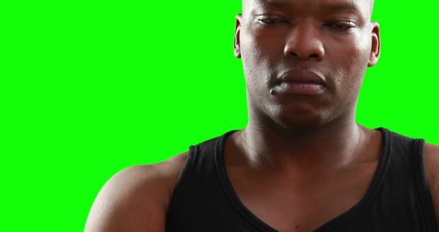 Man in Black Tank Top with Green Background - Download Free Stock Images Pikwizard.com