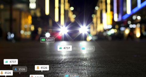 Social Media Icons Overlay on Blurry City Traffic Lights