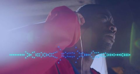 Man Engaged in Outdoor Fitness and Technology