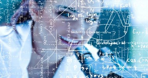 Innovative Scientist Writing Formulas on Glass in Futuristic Lab