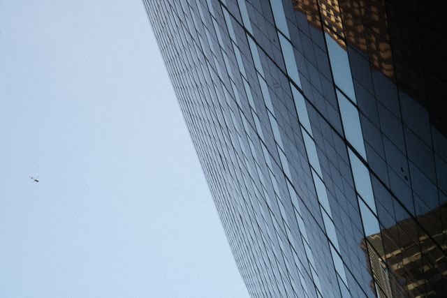 Corporate Skyscraper Reflected in Modern Glass Building - Download Free Stock Photos Pikwizard.com