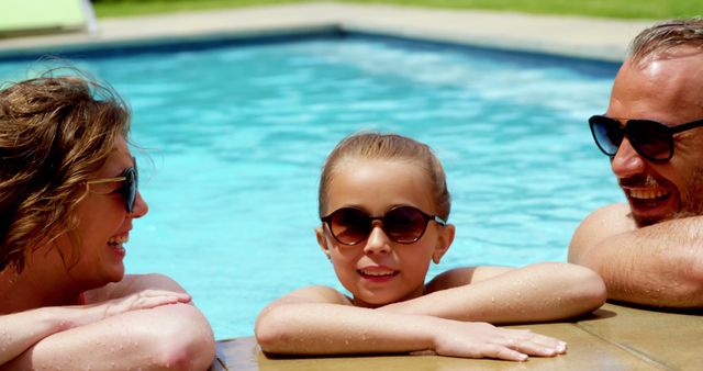 Happy Family Relaxing Together in Swimming Pool - Download Free Stock Images Pikwizard.com