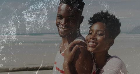 Joyful Couple Embracing on Scenic Beach Getaway