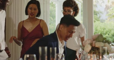 Guests gather for elegant indoor wedding celebration