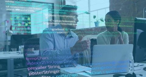 Developers collaborating over laptop with floating code overlay in modern open-plan office