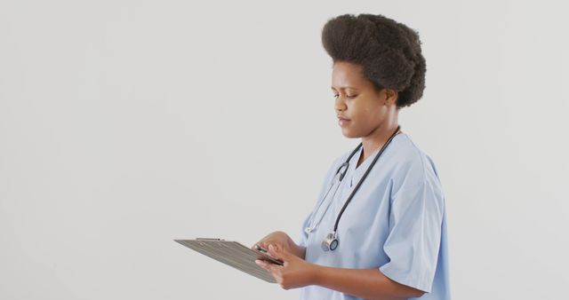 Portrait of happy african american female doctor looking at camera and smiling - Download Free Stock Photos Pikwizard.com