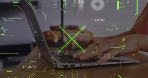 Typing Hands Securing Laptop with Futuristic Green HUD Overlay in Home Kitchen Workspace