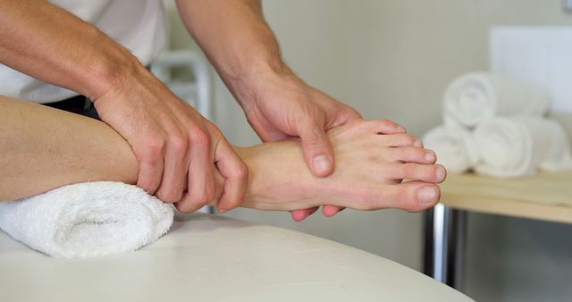 Physiotherapist treating patient foot massage therapy - Download Free Stock Images Pikwizard.com