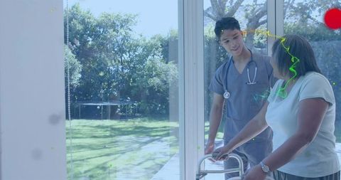 Nurse assisting senior with walker on deck by sliding glass door, homecare outdoor daylight