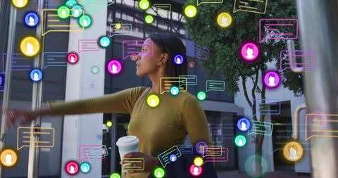 Woman pointing while holding coffee surrounded by colorful social media chat icons