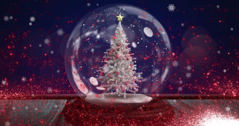 Enchanting Snow Globe with Glittering Christmas Tree