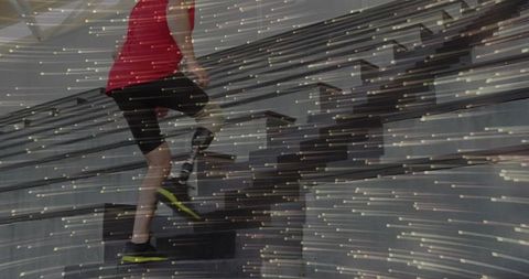 Determined Athlete with Prosthetic Leg on Rehabilitation Stairs