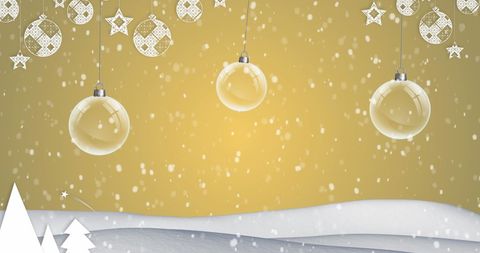 Christmas Ornaments and Snowfall on Warm Yellow Background