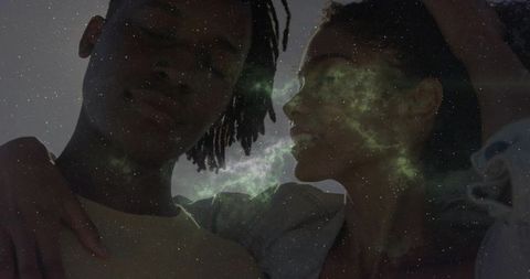 Couple Embracing Under Star-Filled Celestial Sky