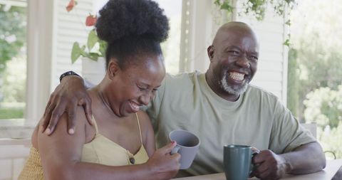 Senior African American Couple Enjoying Morning Coffee Together