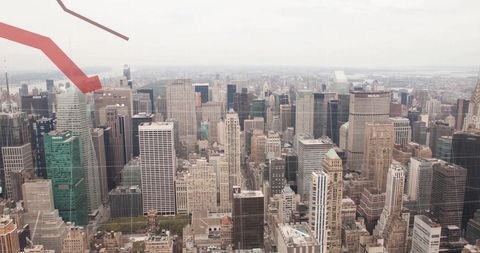 Financial Data Overlay on Cityscape Symbolizing Market Trends