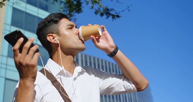 Young Professional Drinking Coffee and Using Smartphone - Download Free Stock Images Pikwizard.com