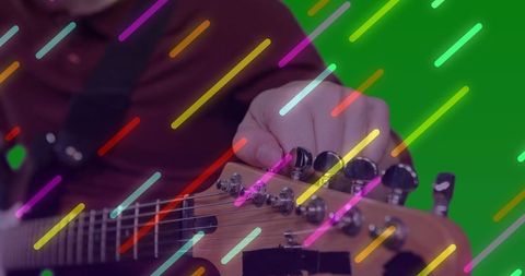Music Creative Concept: Tuning Guitar with Neon Effects