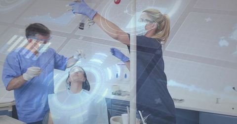 Dental Team Examining Patient in High-Tech Clinic