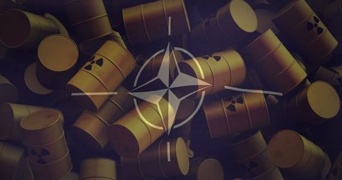 Nato flag over radioactive barrels depicting international crisis