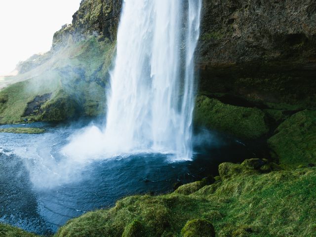 Stunning Waterfall Cascading Over Verdant Cliff with Clear Pool Below - Download Free Stock Photos Pikwizard.com
