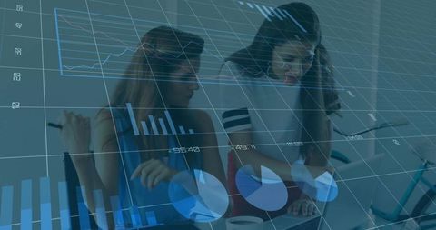 Female Developers Collaborating on Laptop with Holographic Data Visualization and Code Overlay
