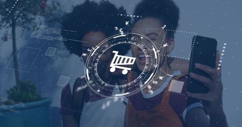 Young women taking selfie holding smartphone showing augmented reality shopping cart