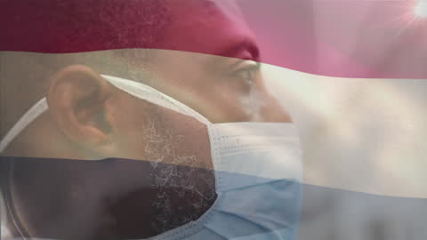 Double Exposure: African American Man with Netherlands Flag During Pandemic