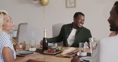 Friends Celebrating with Champagne in Joyous Gathering