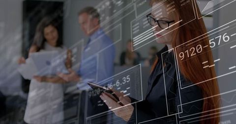 Woman in Conference Room Analyzing Data with Tablet