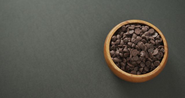 Wooden Bowl Filled with Chocolate Chips on Dark Background - Download Free Stock Images Pikwizard.com