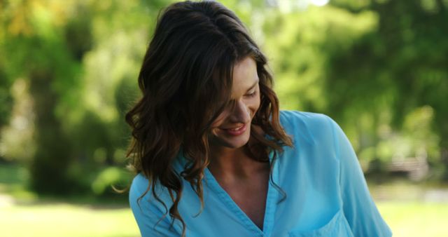 Smiling Woman Enjoying Nature at a Park - Download Free Stock Images Pikwizard.com