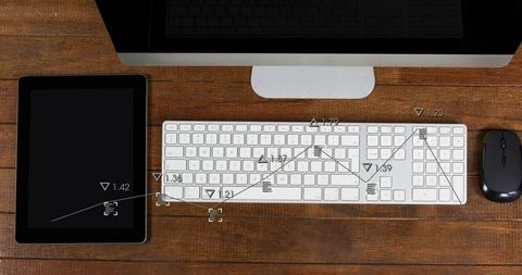 Top-down modern workspace with white wireless keyboard, tablet, mouse and analytics overlays